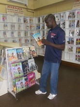 Dounko reading Aya Number 2 at the bookstore