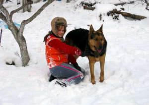 Alina with their dog Moukhtar