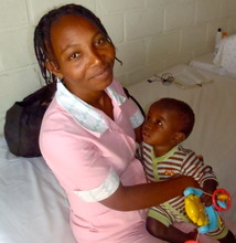 One of Mercy & Sharing's Nannies with an Orphan