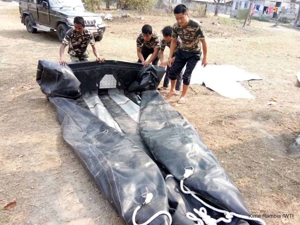 Frontline forest staff with Inflatable boat