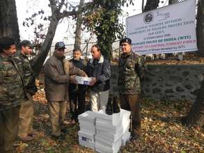 Boots being handed over to frontline forest staff