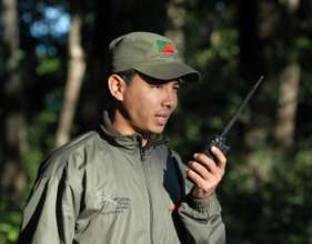 Forest guard wearing rain suit