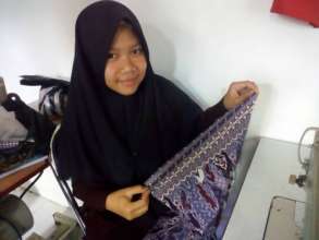 A sewing class student