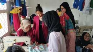 Group discussion at sewing room