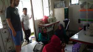 With YUM's women sewing project