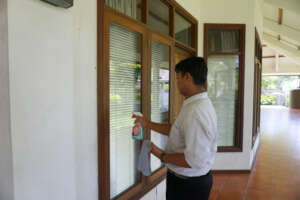 Wiping the room windows
