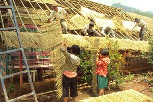 The girls helping to fix their home