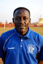Former professional player Head Coach Sam Pam