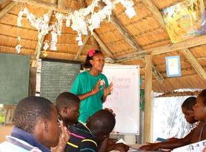 Eco Club member, Ashandy, teaches the kids