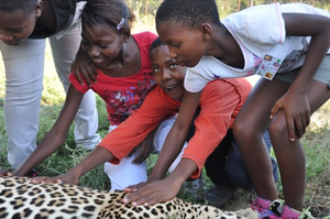 The kids with Shiloweni, our Leopard