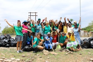 Volunteers, children, community cleanning the Oaks