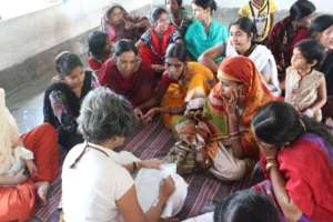 Urmi meeting with women