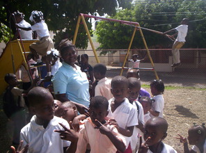 pre-school teacher patrolling the playground