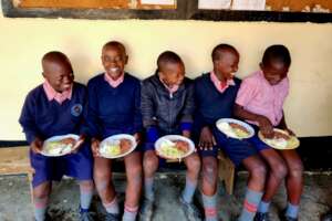 Children having lunch at Fountains of Hope School.