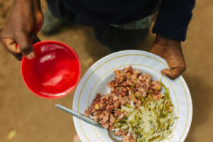 Githeri (boiled maize and beans) and cabbage