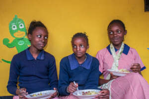 Students having a warm lunch