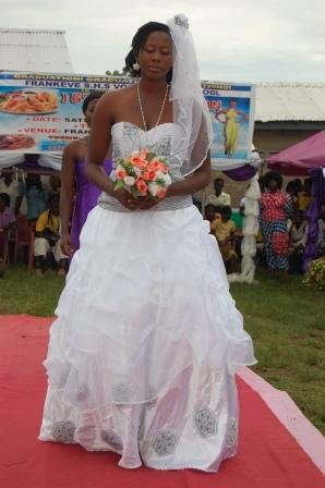 wedding dress showcased by a graduand