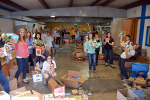 Nobelity Project volunteer team sorting books