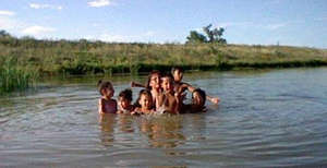 Grandmother Claudia takes the kids swimming