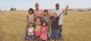 Joe, Lena and kids on children's safe house land