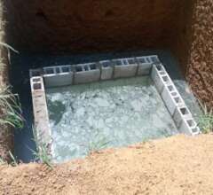 Pit latrine under construction