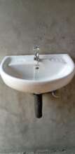 A new hand basin by the toilets