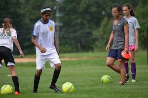 Nikhitha with Coach Ali working on her foot skills