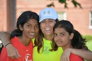 Julie Foudy with Nikhitha (left) & Sangita (right)