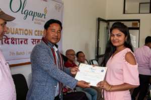 OVS student receives her certificate