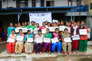 Freed Kamlari display certificate of appreciation