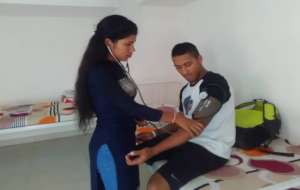 Jeena working as a school nurse