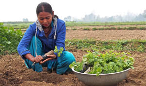 Asmita was a child slave and and now tills a farm