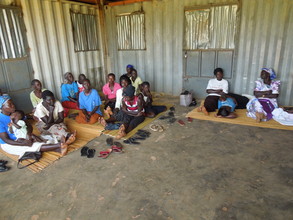 The women at their biweekly microfinancing meeting