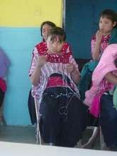 Girl Weaving