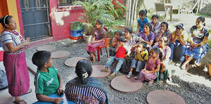 Johanny addresses families at our office