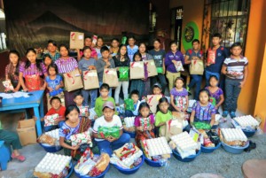 All of our sponsored students with their gifts!