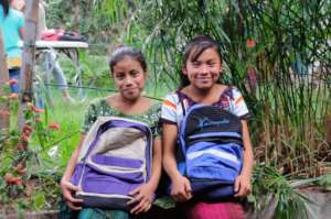 Students with their new backpacks
