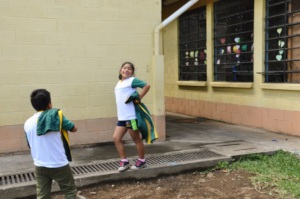 A student shows off her new uniform