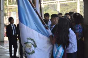 Diego prepares to file in with his classmates