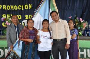 Sponsored student Heidy with her parents