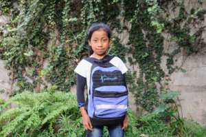 Elena with her school backpack