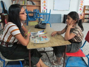 Isabela and Maria Isabel in a tutoring session