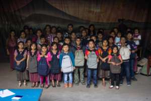 Sponsored students with their new backpacks
