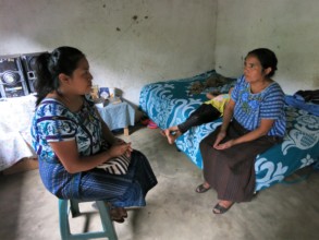 Project Manager, Johanny, visiting the family