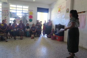 Johanny speaking at a workshop