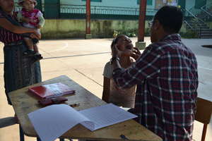 Student receiving a dental checkup
