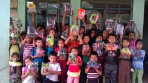 Students receiving their new athletic shoes!