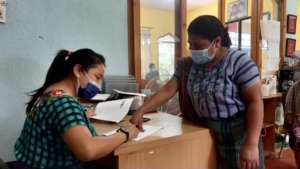 Mother receiving her child's monthly sponsorship