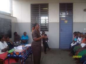 A trainer during a parent meeting