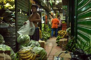 A child in a typical job at the market place